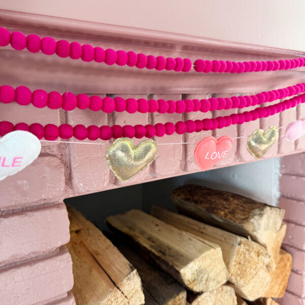 Pink mantel decor garland.