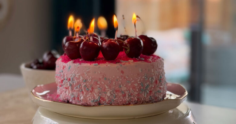 Cherry cake with real cherry candles.