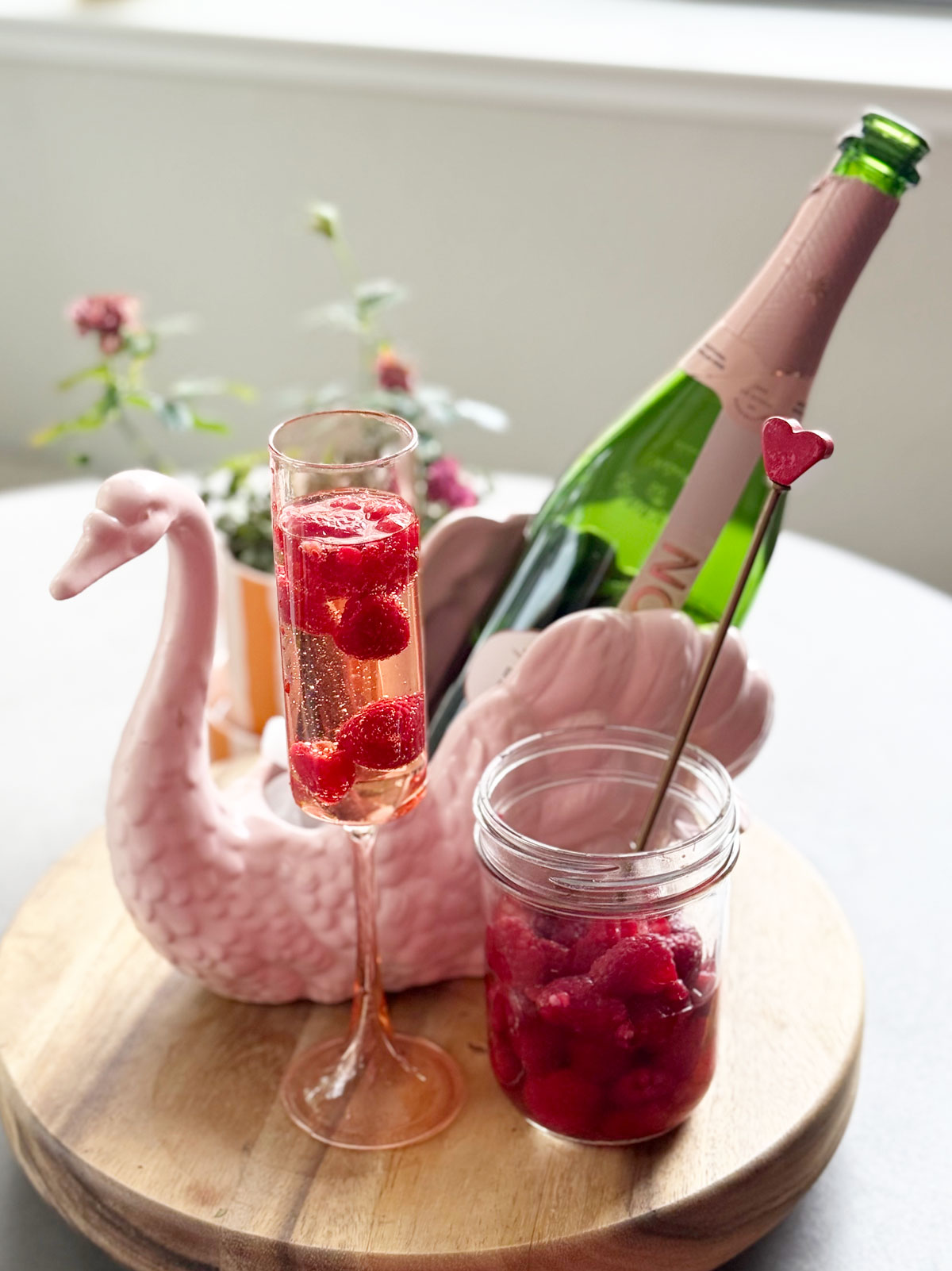 Drunken raspberries in a cocktail for brunch.