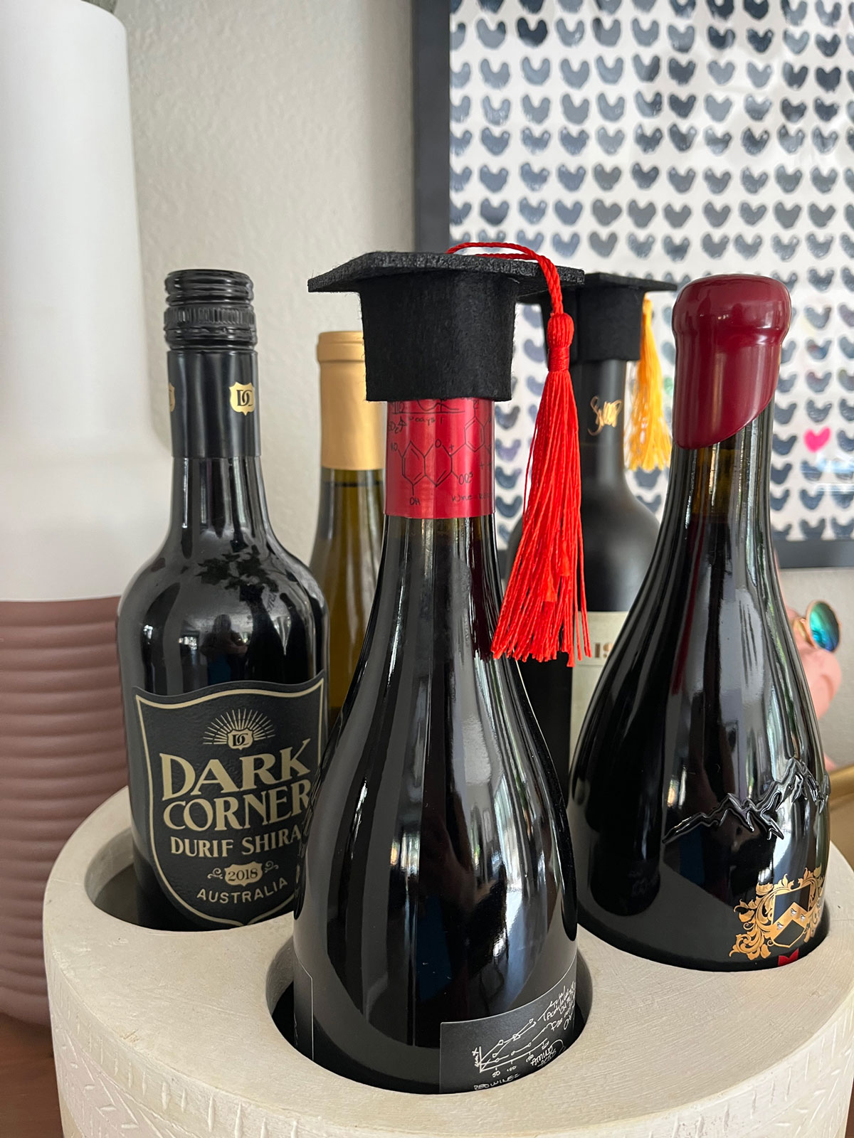 Cute graduation cap bottle toppers.