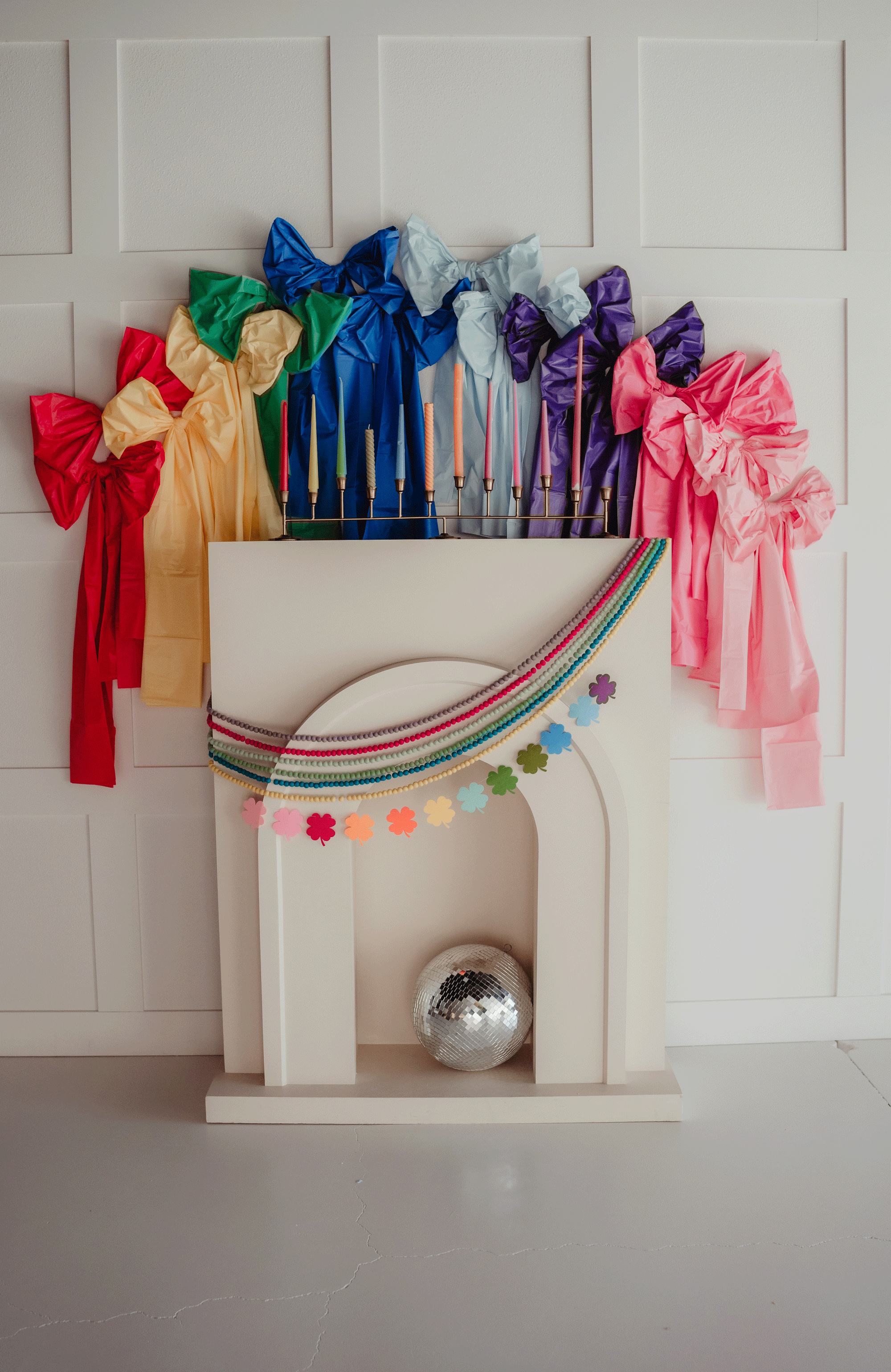 Rainbow tablecloth DIY mantel decor for saint patricks day.