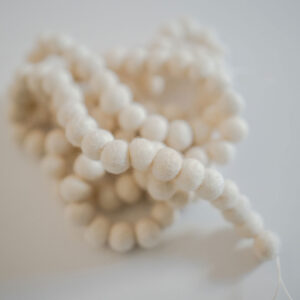 Winter party white felt ball garland.