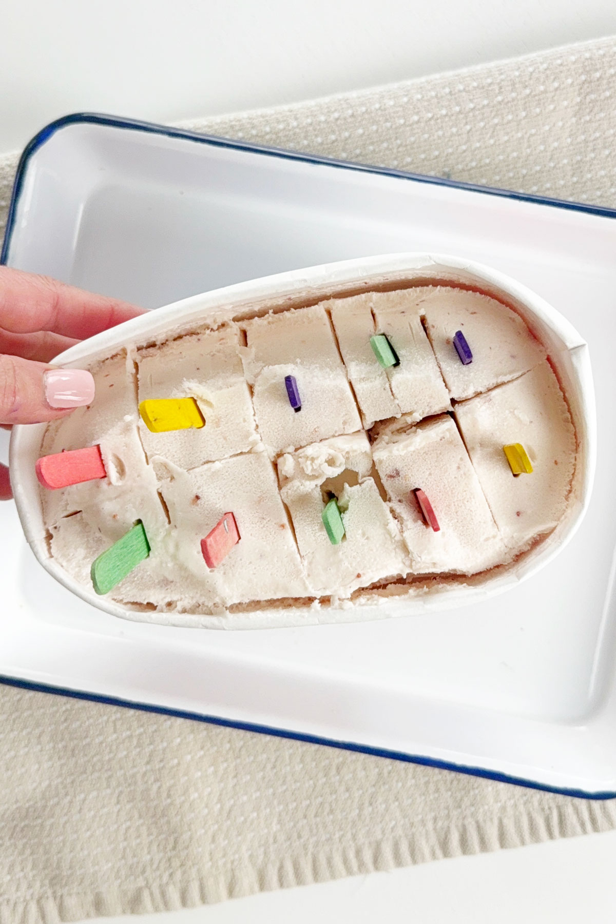 Carton ice cream bar trick to make easy ice cream bars.