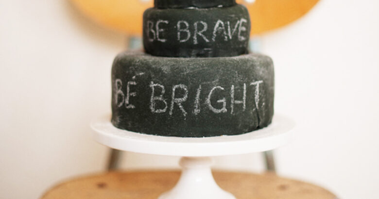 Back to school cake with chalkboard fondant and candy chalk.