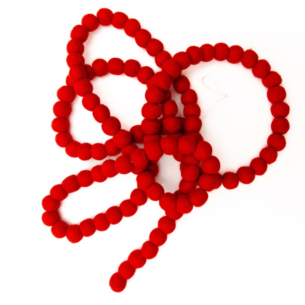 Red pom pom garland.