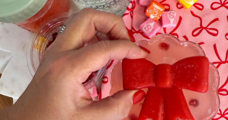 Starburst cocktail recipe with bow toppers.