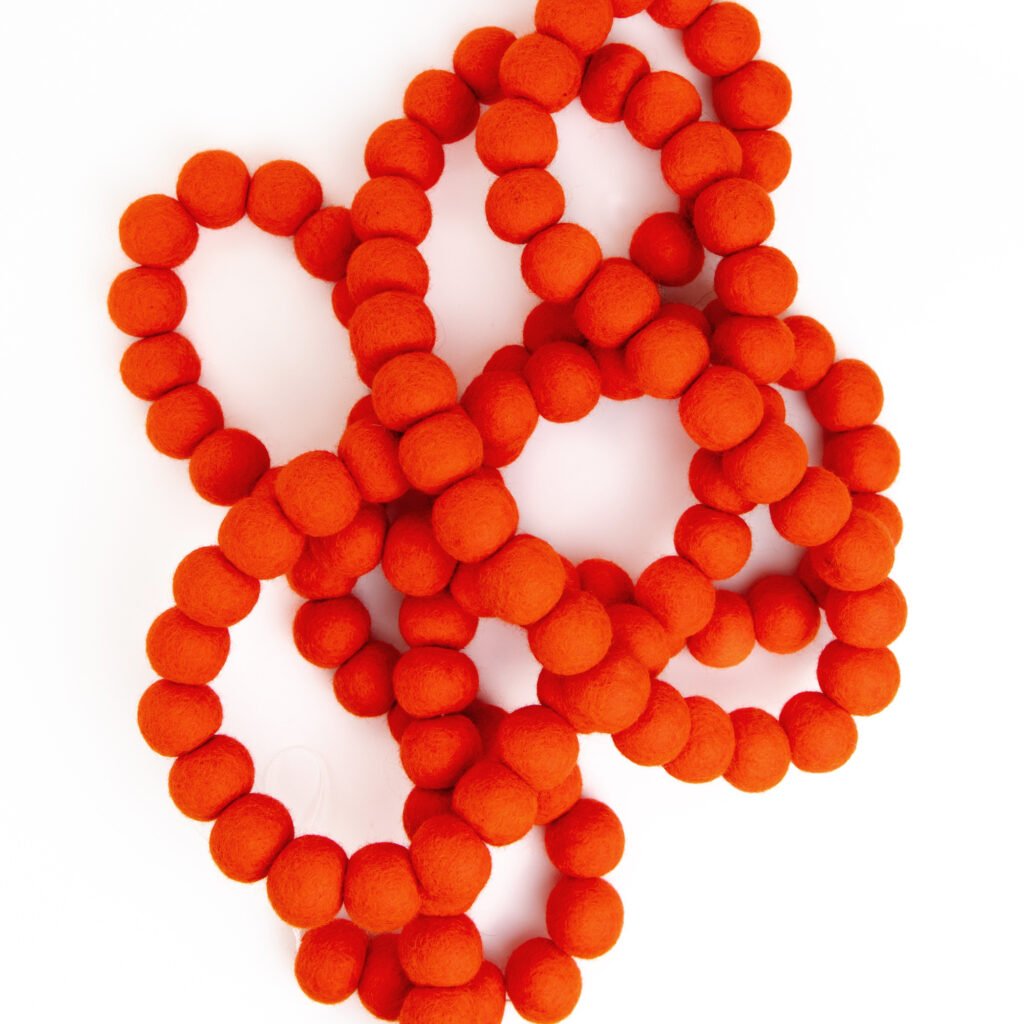 Orange felt ball garland, large wool balls.