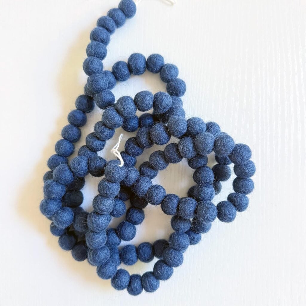 navy blue pom pom garland