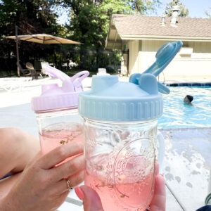 Mason jar summer spritz with Thyme simple syrup.